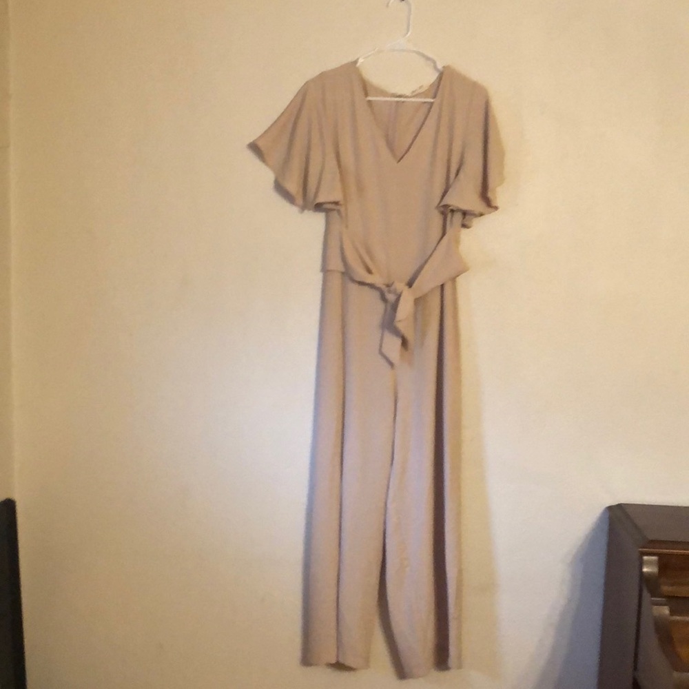 Entro brand with tags jump suit.